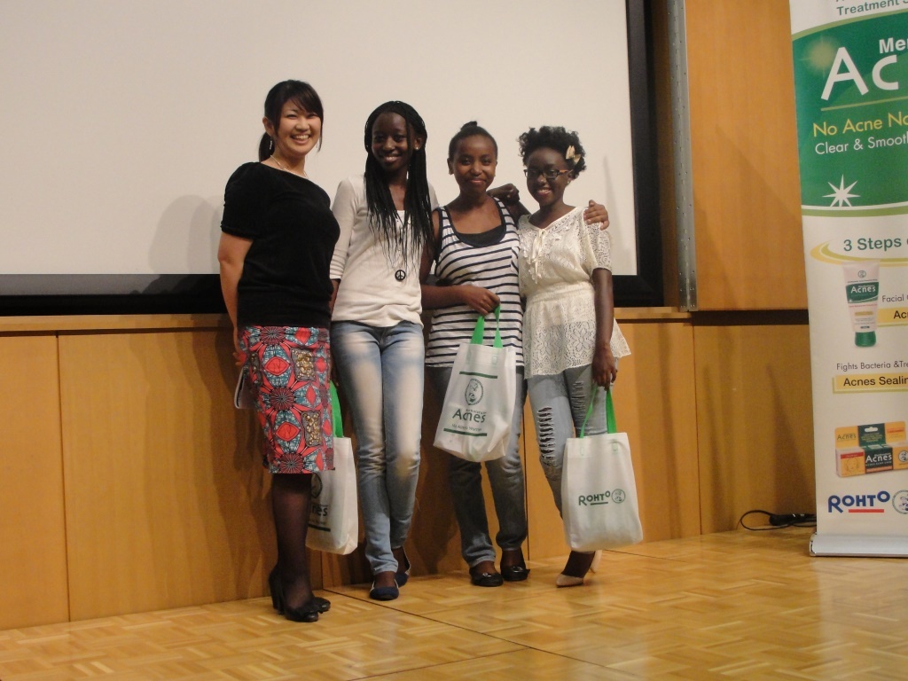 Winners of the Beauty Award pose for a photo with Ms. Akojima, Director, Rohto-Mentholatum (Kenya) Limited