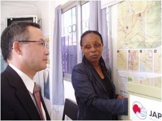 Ms. Mwai, North Star Alliance East Africa manager explains Mr. Yamada about Roadside Wellness centers activities.