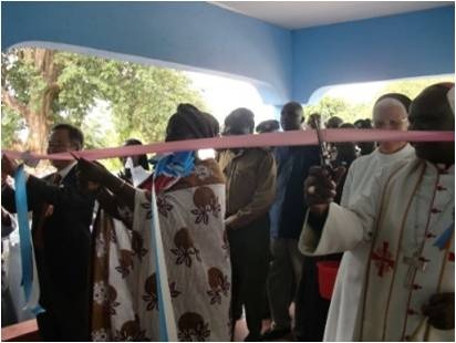 Ribbon cutting by Mr. Yamada, Hon. Kilimo and Bishop Korir (left to right)