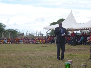 Mr. John Sankok, Director of Community Health Partners giving a speech.