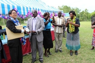 Mr. Mori handing over the key to Prof. Michael Omunyin, school BOG’s Chairman