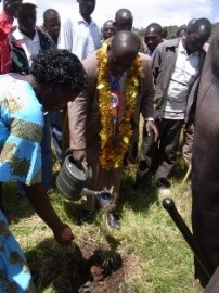 Hon. Ezekiel  Rono planting a tree