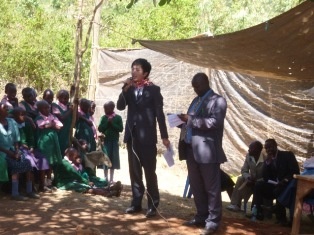 Mr. Yamana giving a speech interpreted in  Kikamba by Mr. Stephen Mutiso