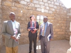 Mr. Yamana touring the current school facilities with Head Teacher and Chairman