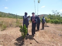 Mr. Yamana touring the current school facilities with Head Teacher and Chairman