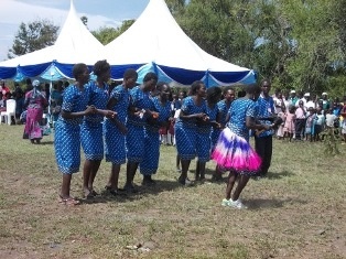 Performance by women group of Economic Empowerment Centre for Women