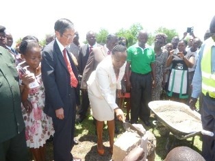 H.E. Mrs. Rachel Ruto laying a stone to start the project