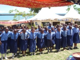 Pupils of St Joseph give a presentation to express joy for having new classrooms.