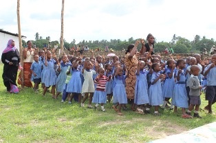 Pupils performing traditional songs and dances