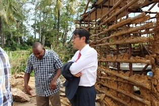 Mr. Mori and Hon. Mustafa touring the school facilities with project coordinator, Mr. Sammy
