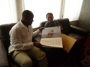 H.E. Ambassador Terada presenting Japan Ikebana Calendar 2015 to Mombasa County Governor, Hon. Hassan Ali Joho