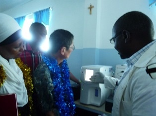 Ambassador Terada recieving the information of Hematology Analyzer from Nihon Koden