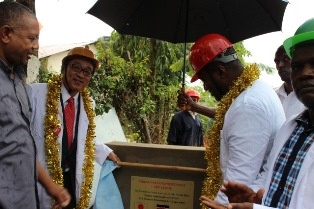 Mr. Mori, Governor and Fr. Wily band Lagho unveiling the plaque