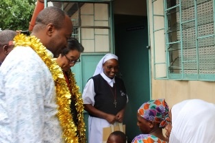 Mr. Mori and H.E. Governor touring the dispensary which has been operated in three cargo containers with Sr. Veronica, coordinator of Mbungoni Catholic Dispensary