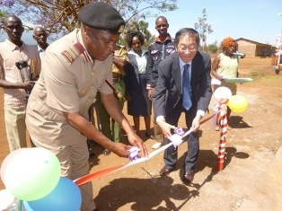 H.E. Mr. Terada andMr. Jeremiah Kikua - The Deputy County Commissioner cutting the ribbon