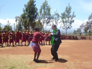 Ambassador Terada dancing with a pupil