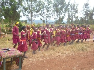 Pupils performing songs and dances