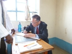 H.E. Tatsushi Terada, Ambassador of Japan  signing the visitor’s book at the Ramula Dispensary