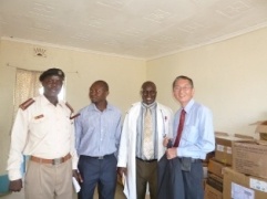Ambassador Terada touring the current facility with officials