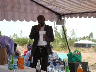 Mr. Sospeter Ngere, Representative of Member of National Assembly, Muhoroni, giving a speech.