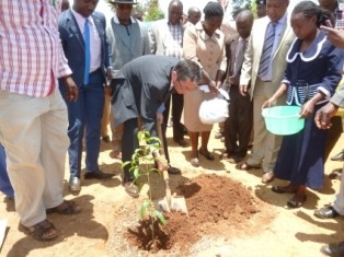 Ambassador Terada planting a tree