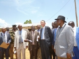 Head Teacher, Mr. James Rianga explaining the school condition to Ambassador Terada