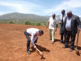 Ambassador Terada breaking the ground to start the project and also planting a mango tree, a popular fruit in Misuuni.