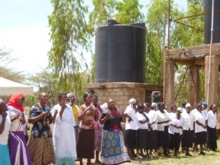 Misuuni Community members expressing joy by singing.