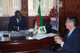 H.E. Mr. Cornel Rasanga and H.E. Mr. Tatsushi Terada having a discussion