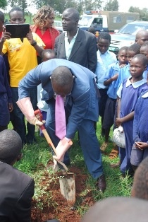 H.E. Mr. Stanley Tarus planting tree