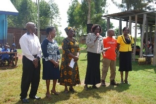 Head teacher introducing Lugalia’s family
