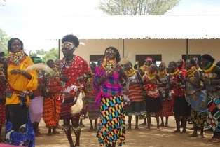 Dancing the traditional dance by the community