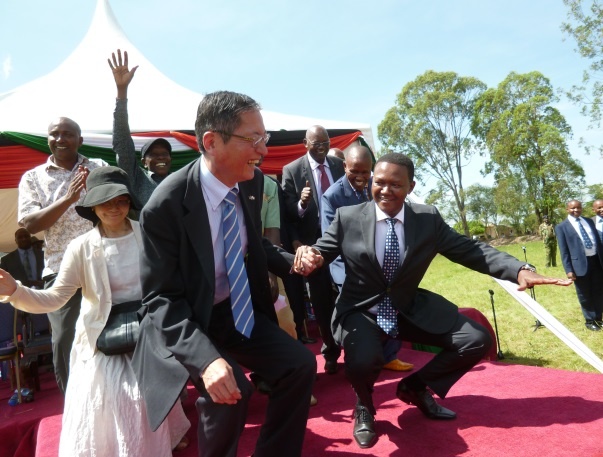 Ambassador Terada and Governor Mutua  dancing together
