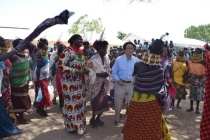 Guests joining the local dance during the ceremony
