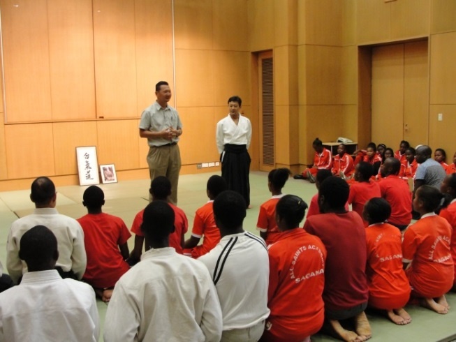 A cross section of the members of the audience about to embark on a training session under Master Kanazawa