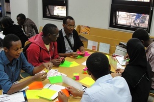 Participants of the Cultural Festival learning how to make origami