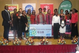The participants and sponsors of the Nodojiman Singing Competition posing for a group photo. Ms. Gichuki (center) winner of the Nodojiman singing competition