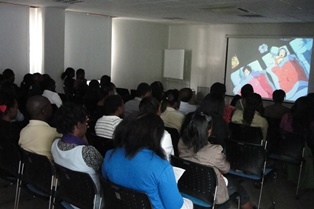 A cross section of the audience watching a Japanese animation
