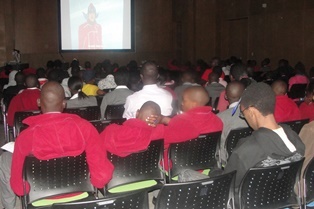 A cross-section of the audience watching a movie