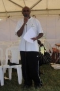Mr. Kimani of Juhudi Children's Club giving his Opening Remarks