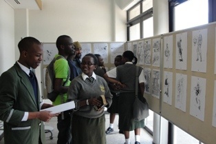 Participants Reading Manga by Kenyan Manga Artist Shin Kyouketsuki