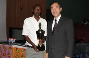 H.E. Ambassador Toshihisa Takata with Mr. Martin Tobiko Koipa, winner of the 2013 Japanese Speech Contest