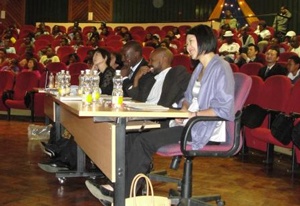 The judges and a cross-section of the audience listening to the speeches