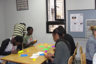 Participants trying their hand at origami
