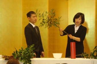 Mrs. Ishikawa and her assistant working on a piece