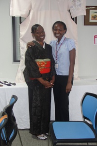 The Fully-dressed Model Posing with a member of the Audience