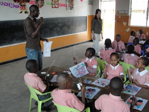 Students being instructed on how to make kites