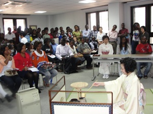 Demonstration of tea serving: the venue was crowded and many had to stand