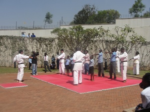 Audience leaning the basics of Karate