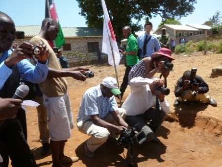 Representatives of media taking photos